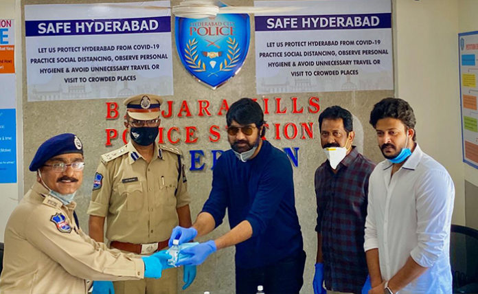Hero Srikanth Distributed Sanitizers and Masks to Police Hero Srikanth Distributed Sanitizers and Masks to Police